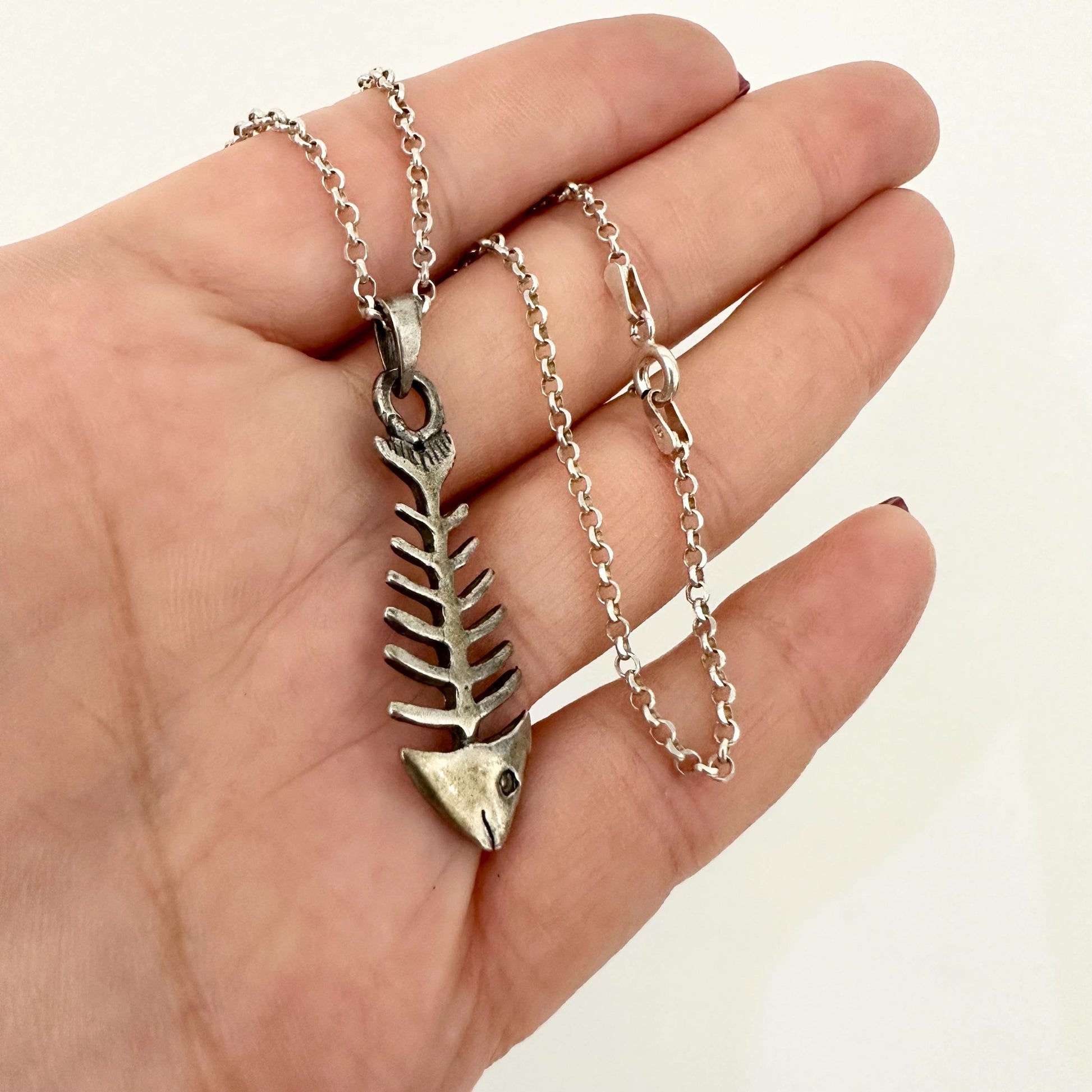 Silver Fish Skeleton Pendant Necklace by Garust